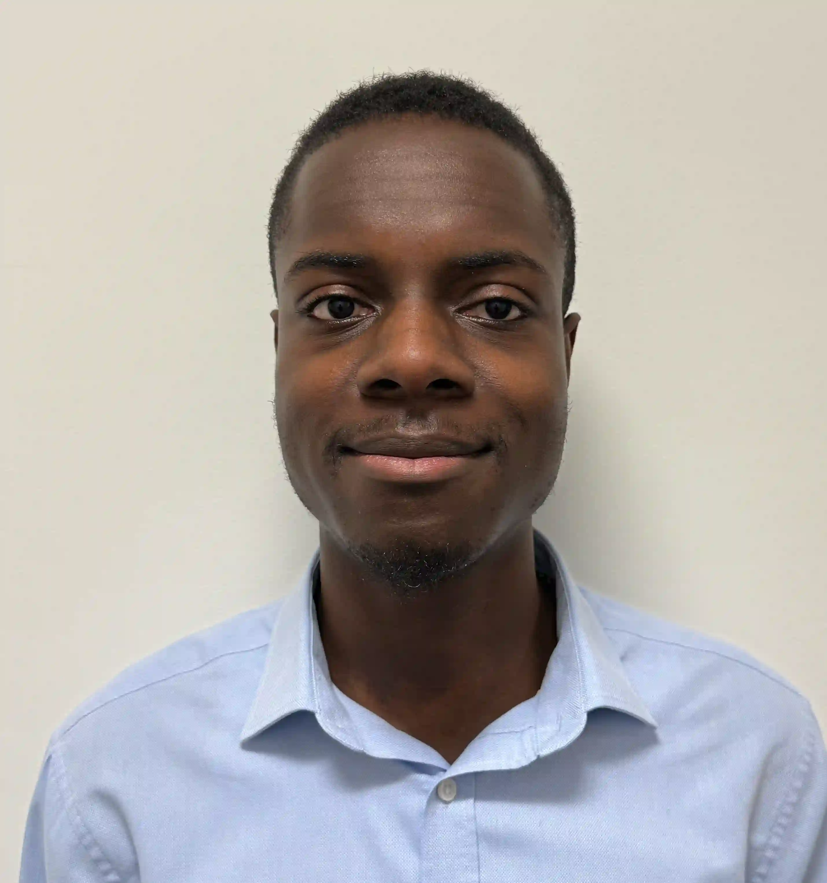 Black & white protrait of Tobi Adeniji in white background